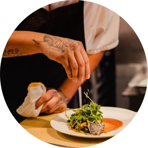 img of chef prepping plate